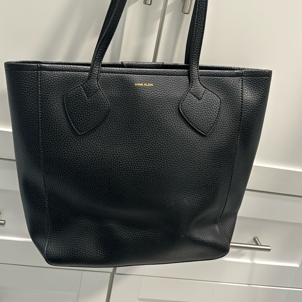 Black leather Anne Klein tote with top zipper and inside pouch